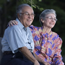 elderly couple sitting together